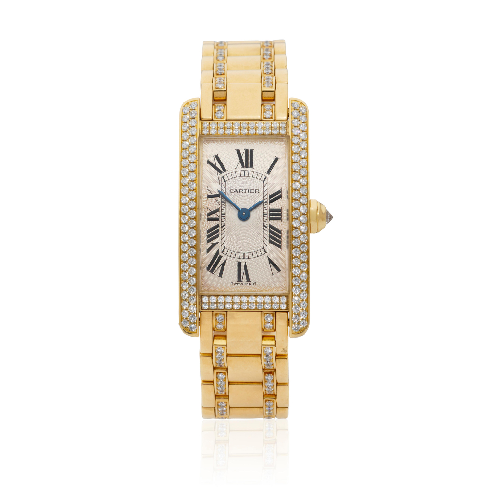 Cartier. A lady's 18K gold and diamond set quartz bracelet watch
