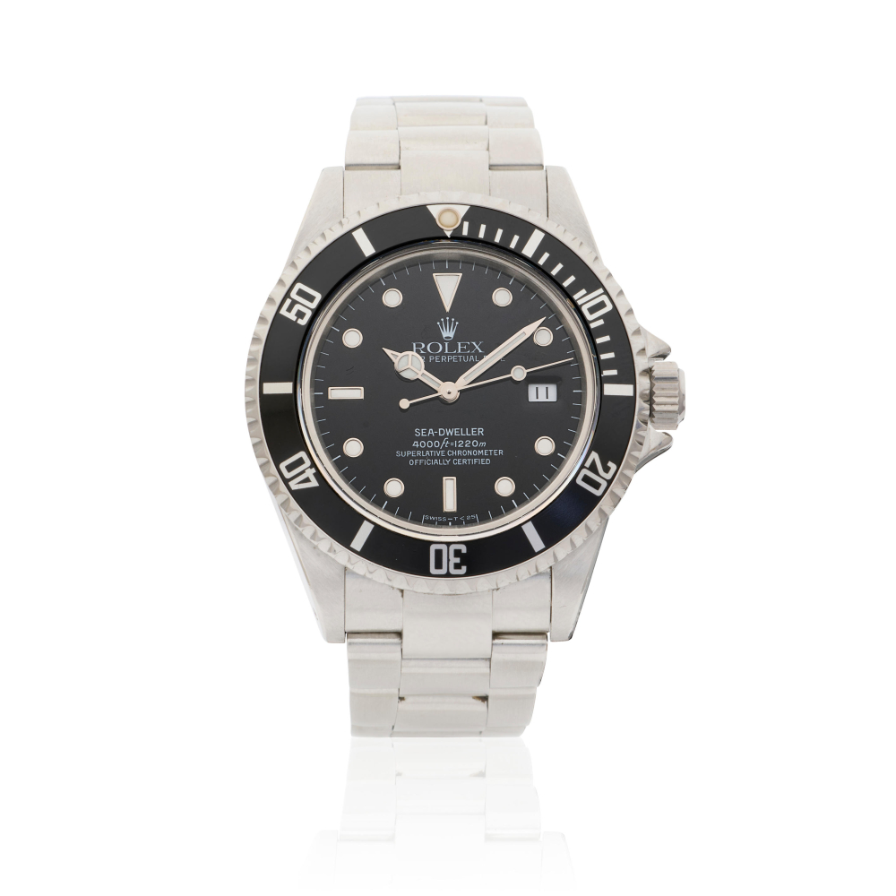 Rolex. A stainless steel automatic calendar bracelet watch