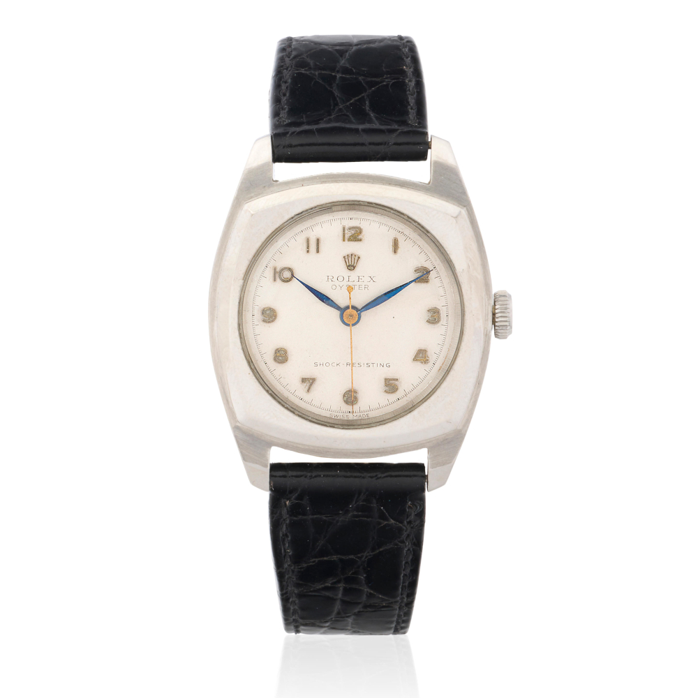 Rolex. A stainless steel manual wind wristwatch