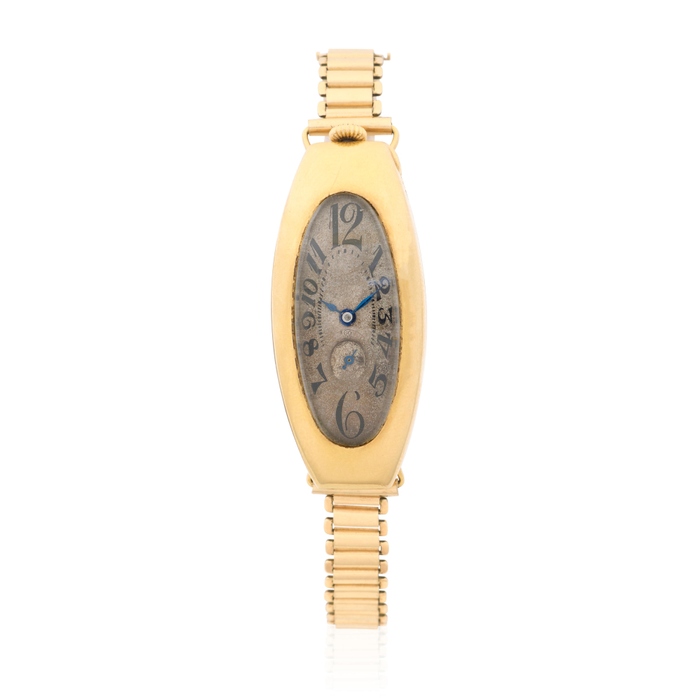 Movado. A rare 18K gold manual wind curved rectangular bracelet watch