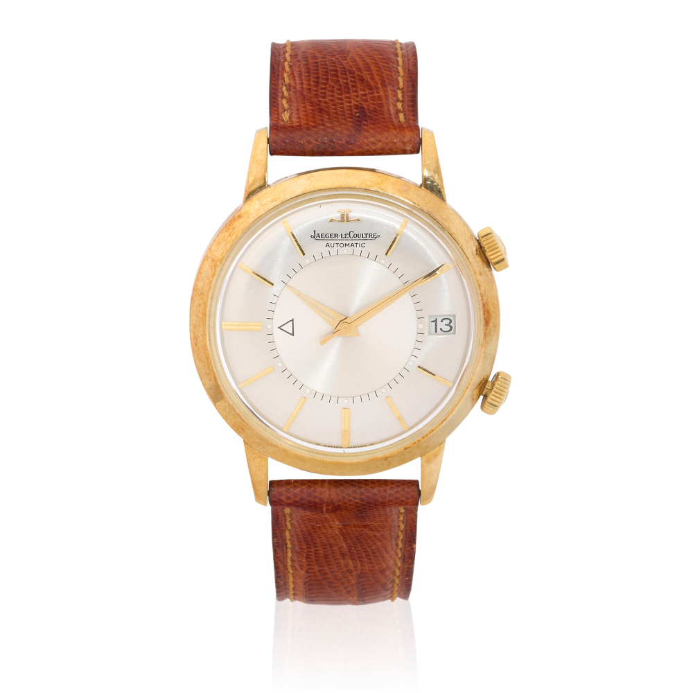 Jaeger-LeCoultre. A 14K gold and stainless steel bumper automatic calendar wristwatch with alarm