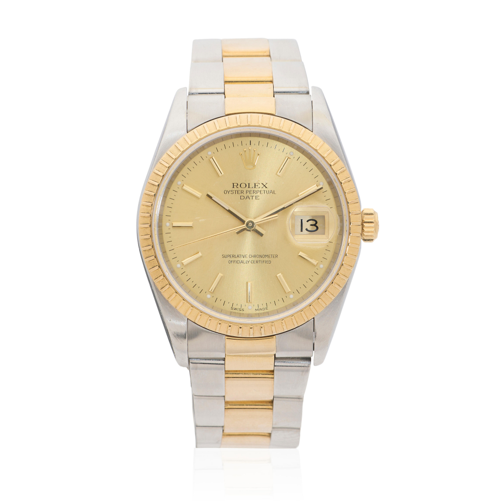 Rolex. A stainless steel and gold automatic calendar bracelet watch
