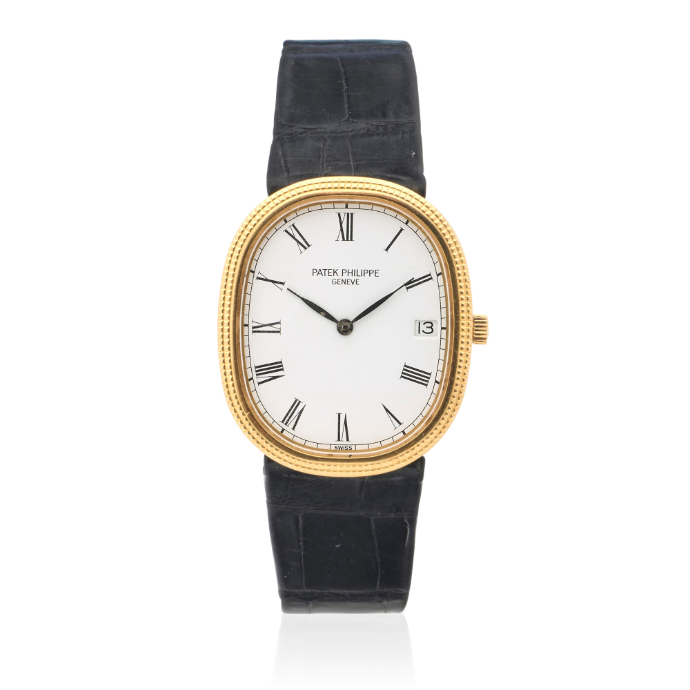 Patek Philippe. An 18K gold quartz calendar wristwatch
