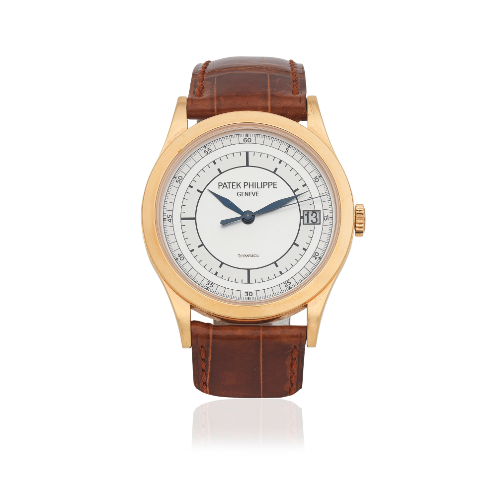 Patek Philippe. An 18K rose gold automatic calendar wristwatch retailed by Tiffany Co.