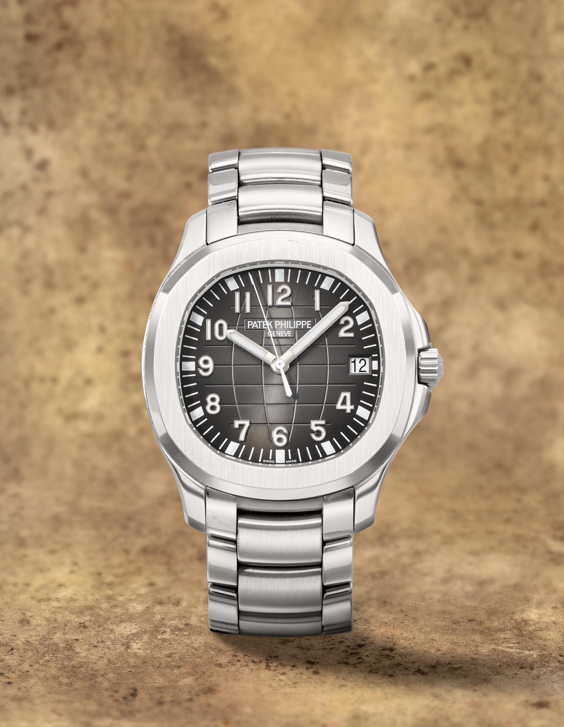 Patek Philippe. A fine and rare stainless steel automatic calendar bracelet watch