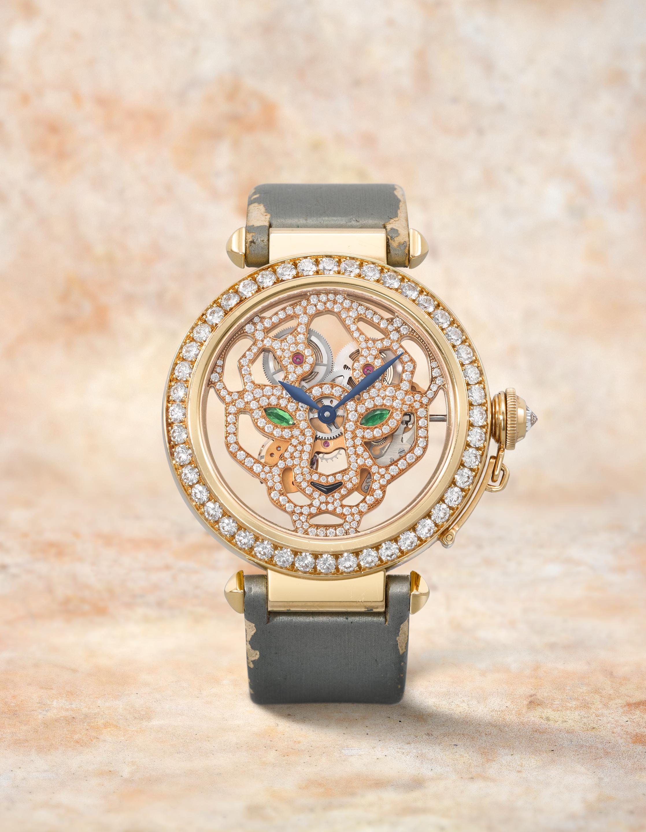Cartier. A fine 18K rose gold and diamond set skeletonised manual wind wristwatch