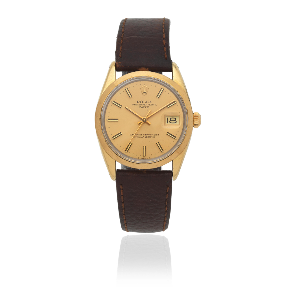 Rolex. A stainless steel gold plated automatic calendar wristwatch