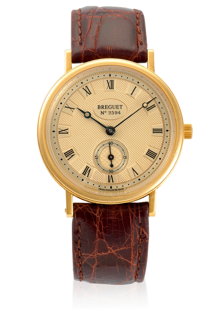 BREGUET. AN 18K GOLD MANUAL WIND WRISTWATCH