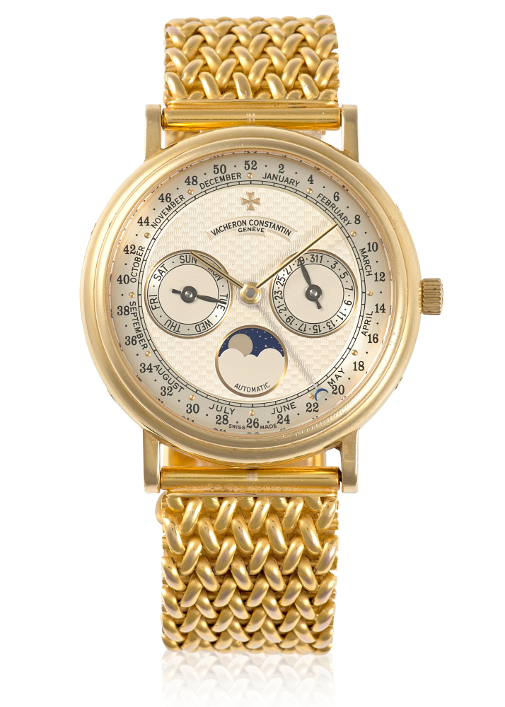 VACHERON CONSTANTIN. AN 18K GOLD AUTOMATIC ANNUAL CALENDAR BRACELET WATCH WITH MOON PHASE