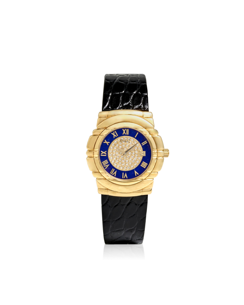 PIAGET. AN 18K GOLD QUARTZ CALENDAR WRISTWATCH