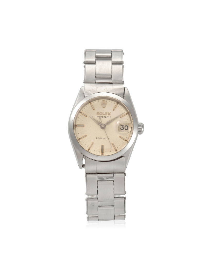 ROLEX. A STAINLESS STEEL MANUAL WIND CALENDAR BRACELET WATCH