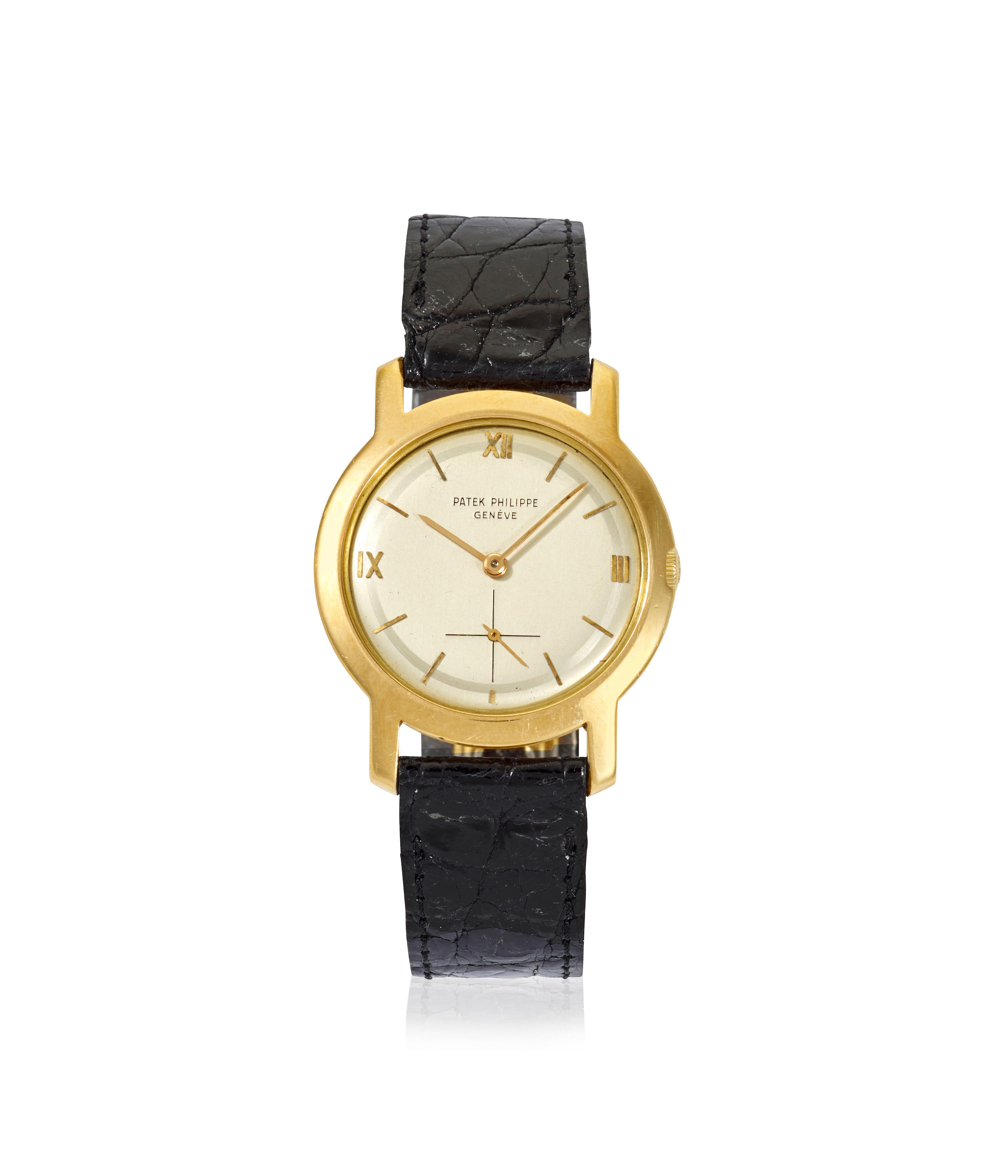 PATEK PHILIPPE. AN 18K GOLD MANUAL WIND WRISTWATCH
