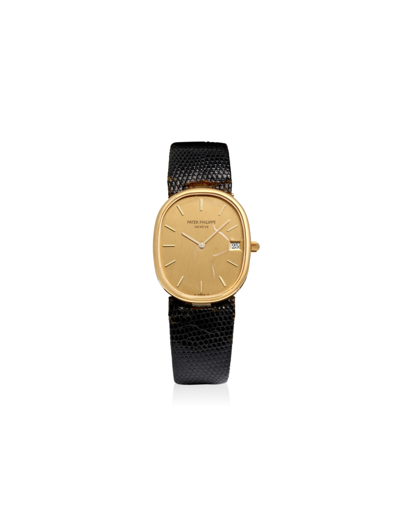 PATEK PHILIPPE. AN 18K GOLD MANUAL WIND CALENDAR WRISTWATCH