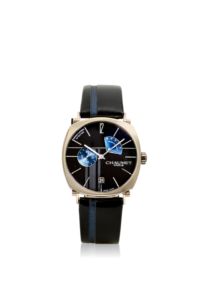 CHAUMET. A LIMITED EDITION 18K WHITE GOLD MANUAL WIND CALENDAR WRISTWATCH WITH POWER RESERVE INDICATION