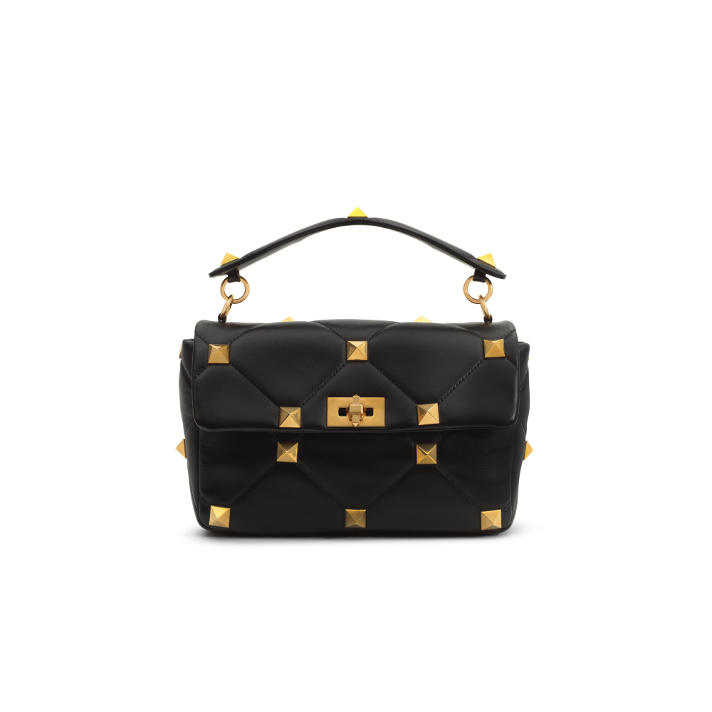 Dame Joan Collins: a Valentino Garavani Black Roman Stud Handbag