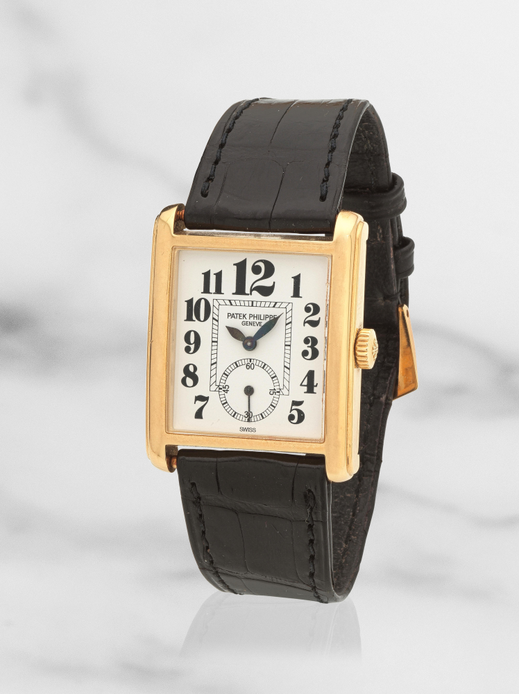 Patek Philippe. A fine rectangular 18K gold manual wind wristwatch