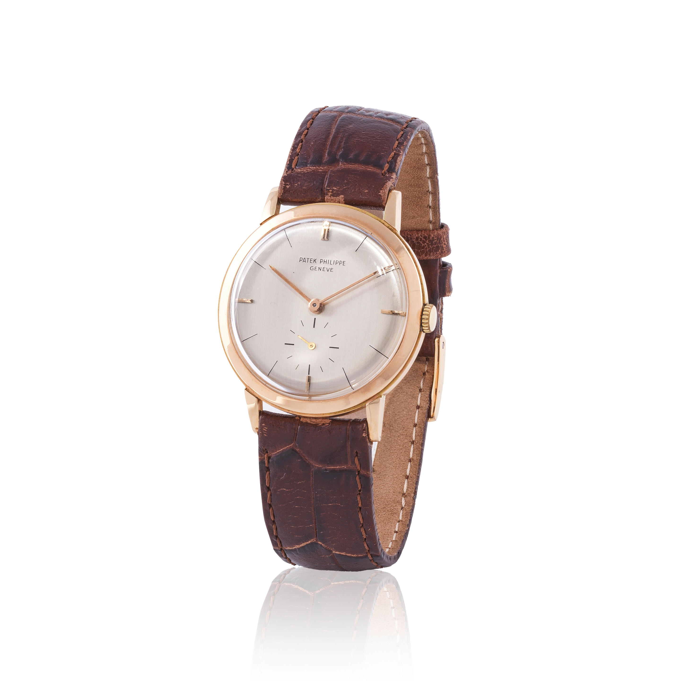 Patek Philippe. An 18K gold manual wind wristwatch