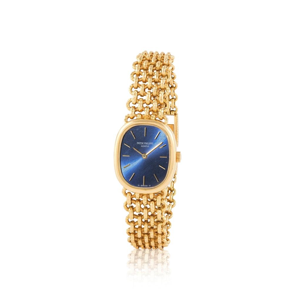 Patek Philippe. A fine lady's 18K gold manual wind bracelet watch