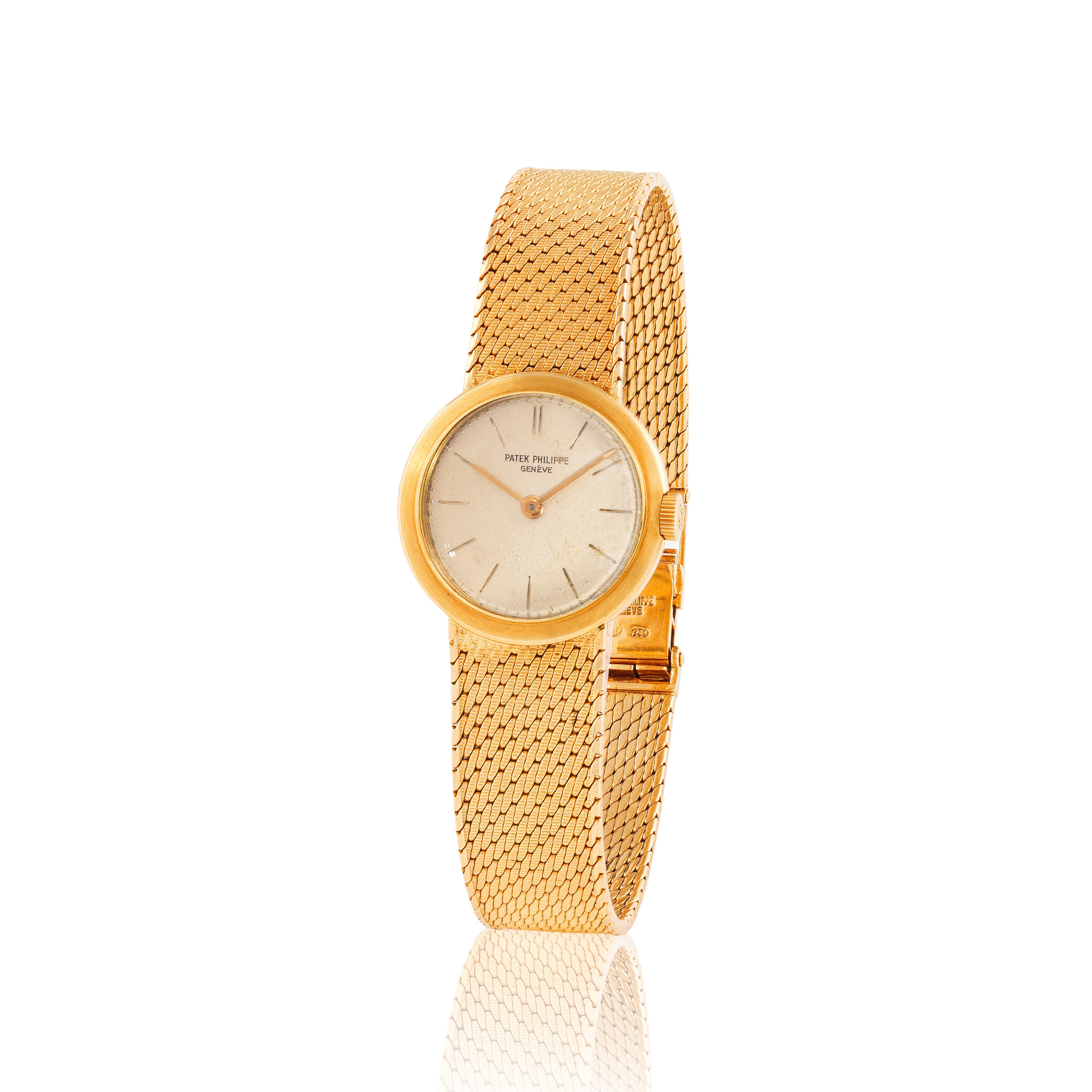Patek Philippe. A lady's 18K gold manual wind bracelet watch