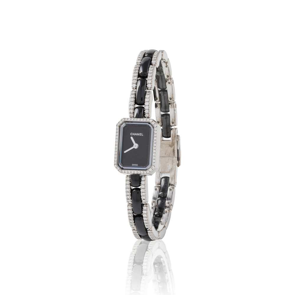 Chanel. A lady's black ceramic and 18K white gold diamond set quartz bracelet watch