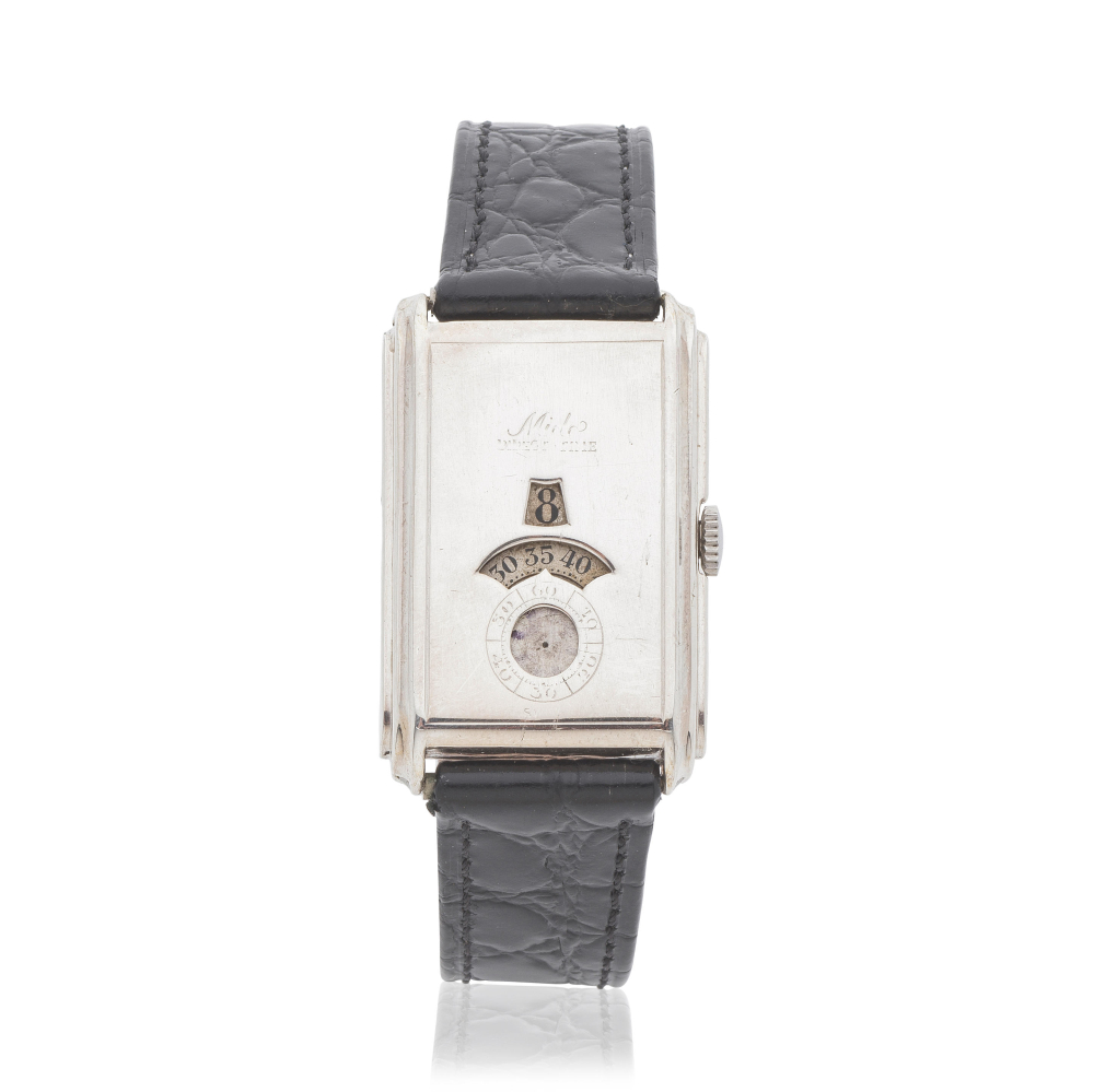 Mido. A rare silver manual wind wristwatch with jump hour dial