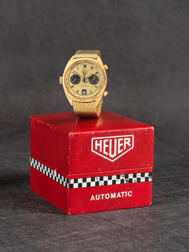 Heuer. A fine and rare 18K gold automatic calendar chronograph bracelet watch formerly the property of Terence Regan offered on behalf of the family of the original owner