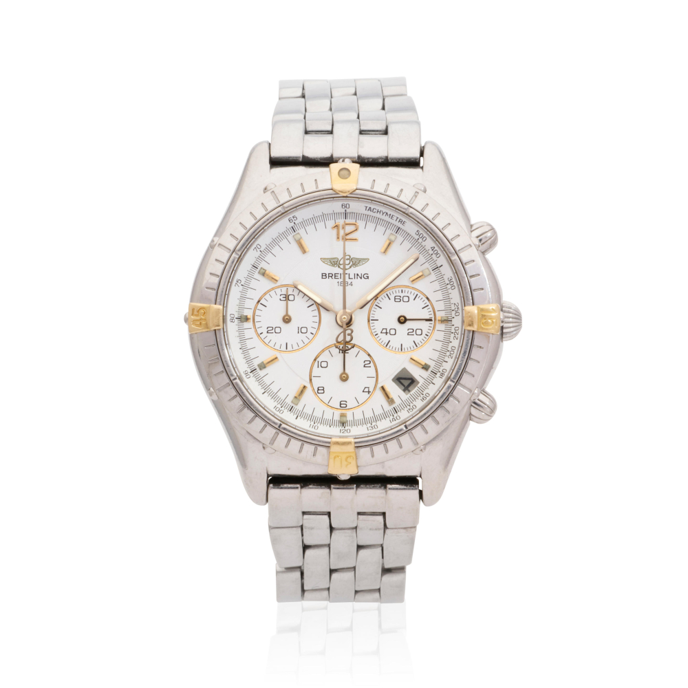 Breitling. A stainless steel and gold automatic calendar chronograph bracelet watch