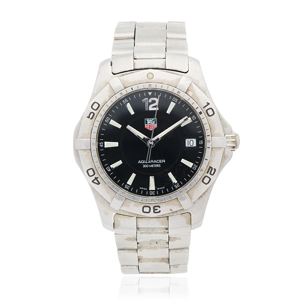 TAG Heuer. A stainless steel quartz calendar bracelet watch