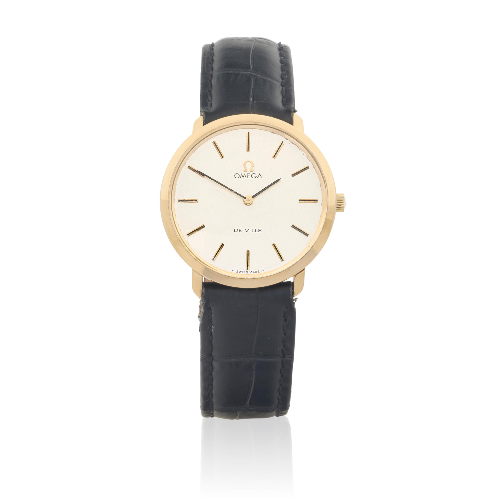 Omega. A 9K gold manual wind wristwatch