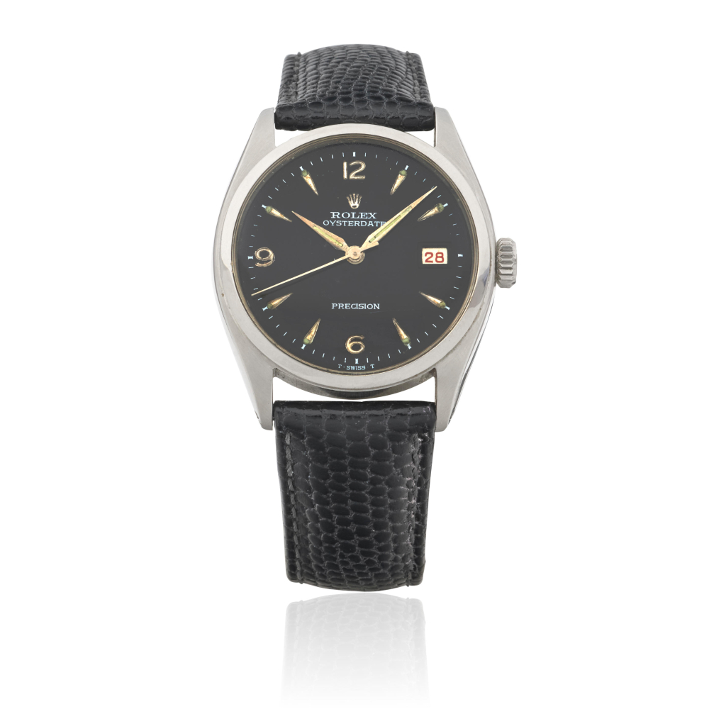 Rolex. A stainless steel manual wind calendar wristwatch