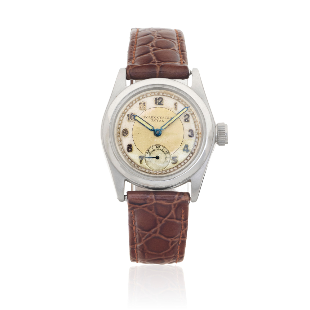Rolex. A stainless steel manual wind wristwatch