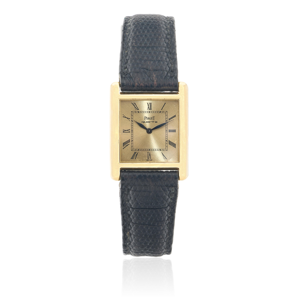 Rolex. A lady's 18K gold manual wind wristwatch