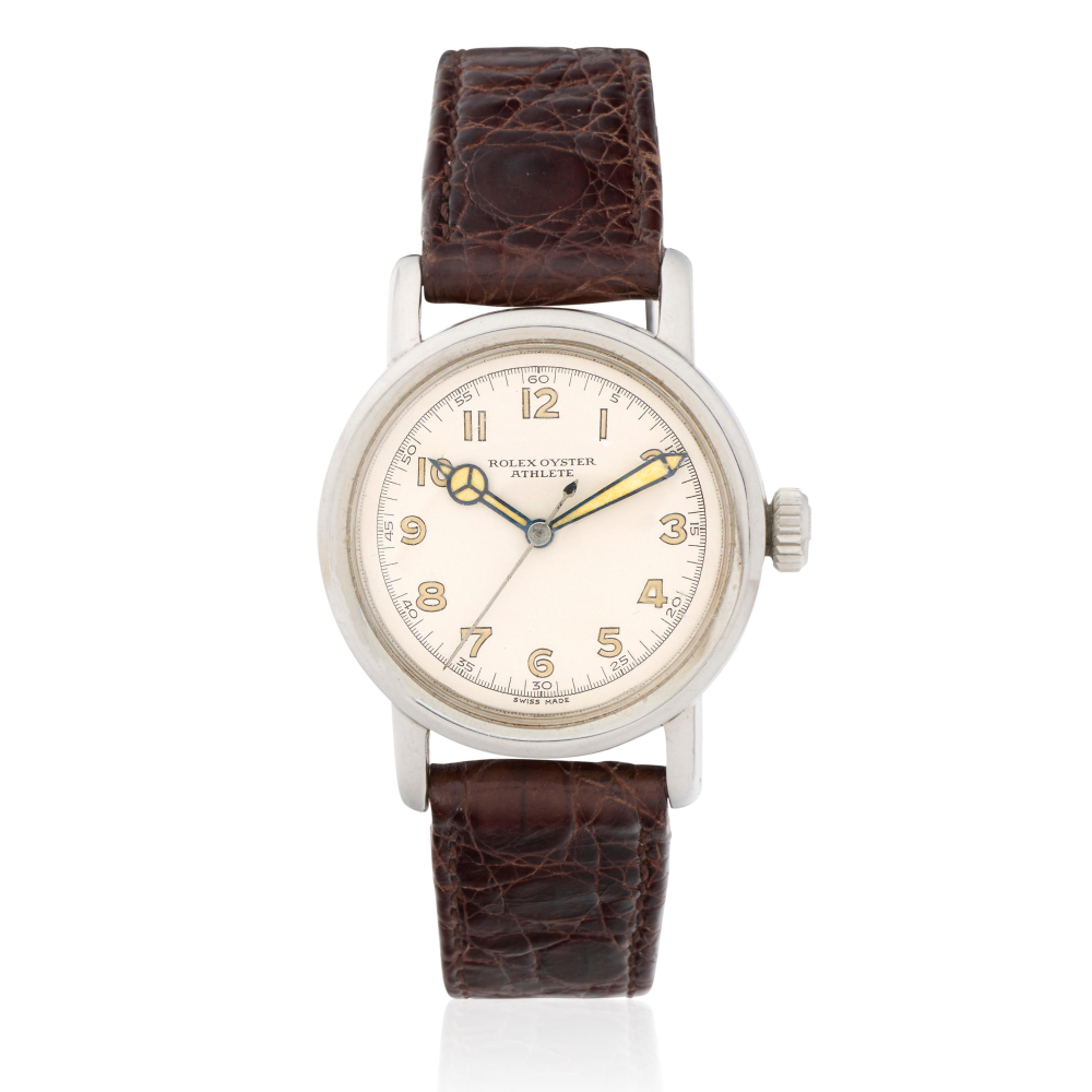 Rolex. A stainless steel manual wind wristwatch