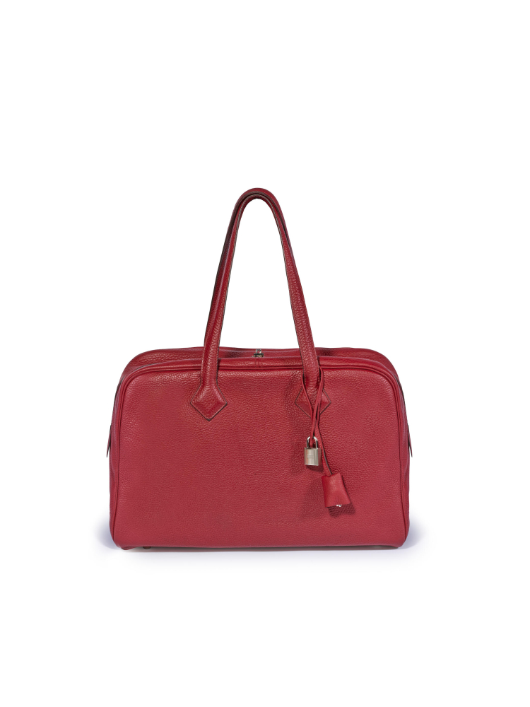HERMÈS: ROUGE GARANCE TAURILLON CLEMENCE VICTORIA TRAVEL BAG WITH PALLADIUM HARDWARE