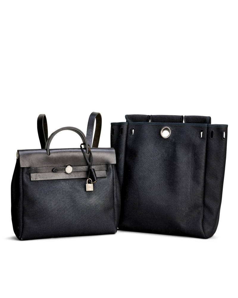 HERMÈS: BLACK TOILE 2-IN-1 BACKPACK HERBAG WITH BRUSHED PALLADIUM HARDWARE