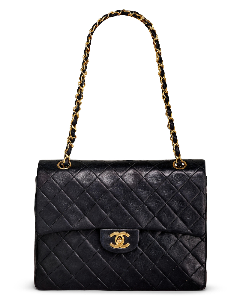 CHANEL: BLACK QUILTED LAMBSKIN VINTAGE FLAP BAG WITH GOLD TONED HARDWARE 1986-1988