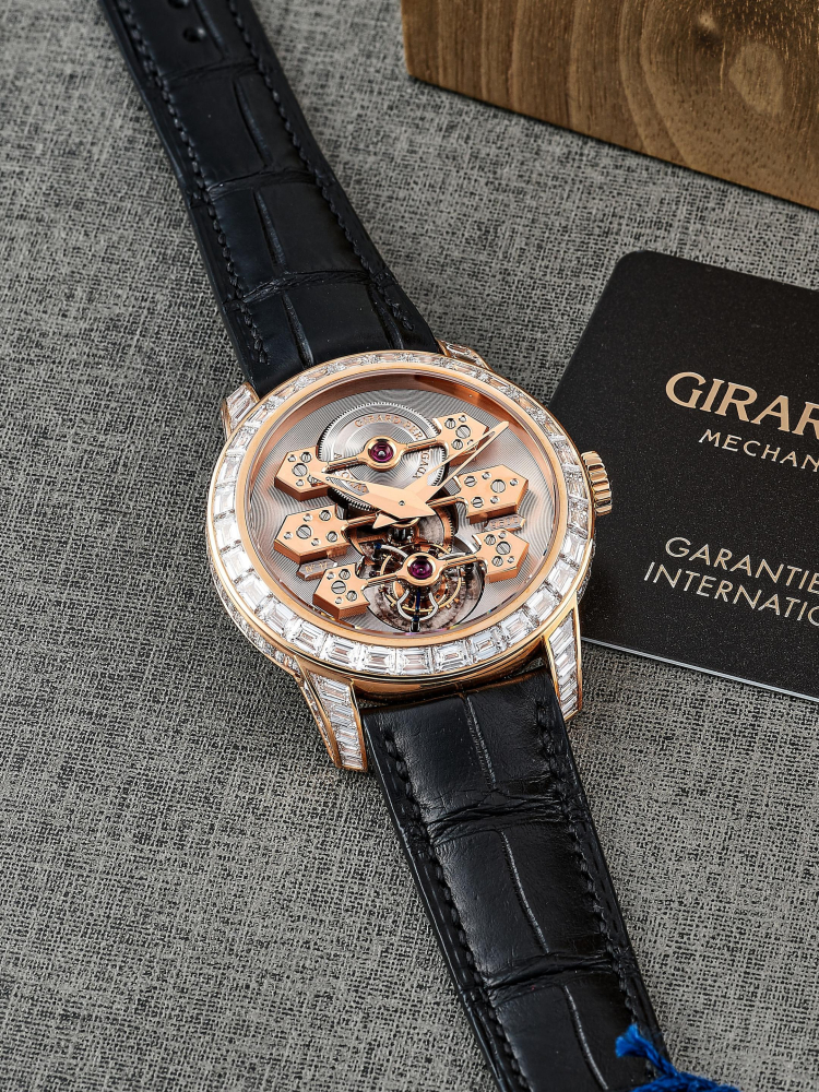 GIRARD-PERREGAUX | TRI-BRIDGE, REF.99193-52-001, A NEW OLD STOCK LIMITED EDITION PINK GOLD, BAGUETTE AND SPECIAL-CUT DIAMOND-SET THREE GOLD BRIDGES TOURBILLON WRISTWATCH, CIRCA 2012