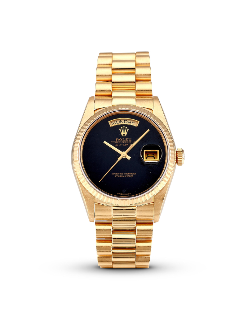 ROLEX | DAY-DATE, REF.18038, A YELLOW GOLD BRACELET WATCH WITH DAY, DATE AND ONYX DIAL, CIRCA 1986