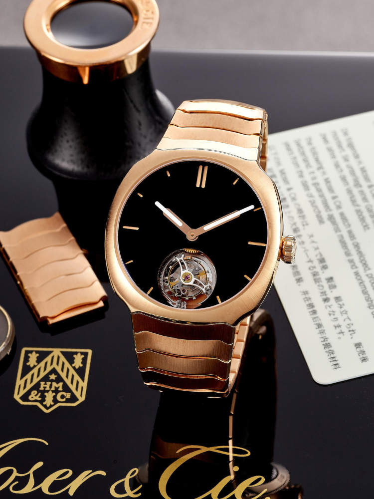 H. MOSER CIE | STREAMLINER TOURBILLON, REF.6804-0400, A FINE LIKE-NEW PINK GOLD TOURBILLON BRACELET WATCH WITH VANTABLACK® DIAL, CIRCA 2022
