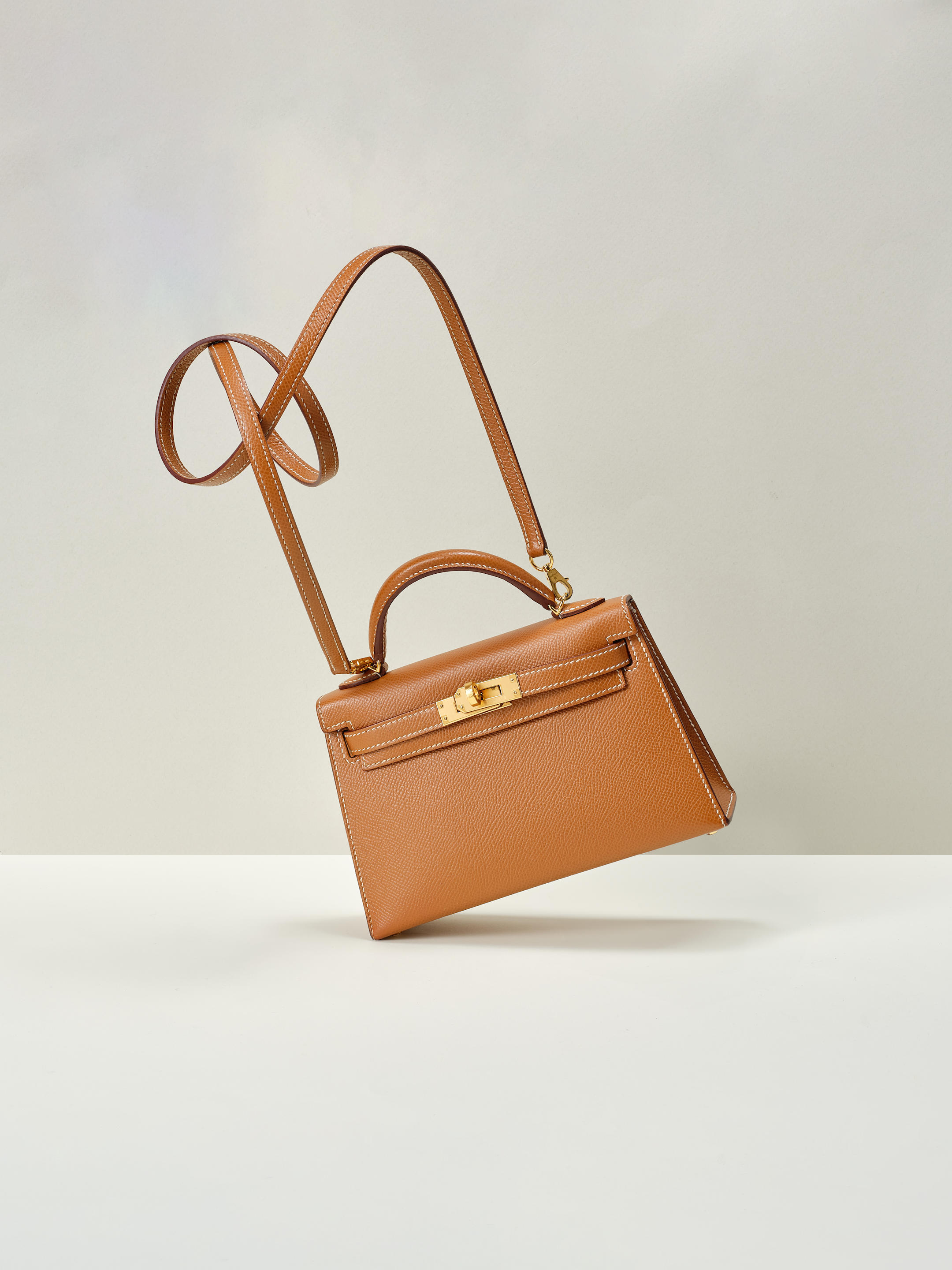 HERMÈS: GOLD EPSOM MINI KELLY II WITH GOLD HARDWARE 2022