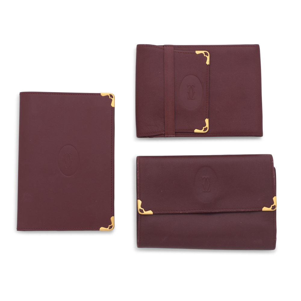 Must de Cartier: Three Burgundy Wallets