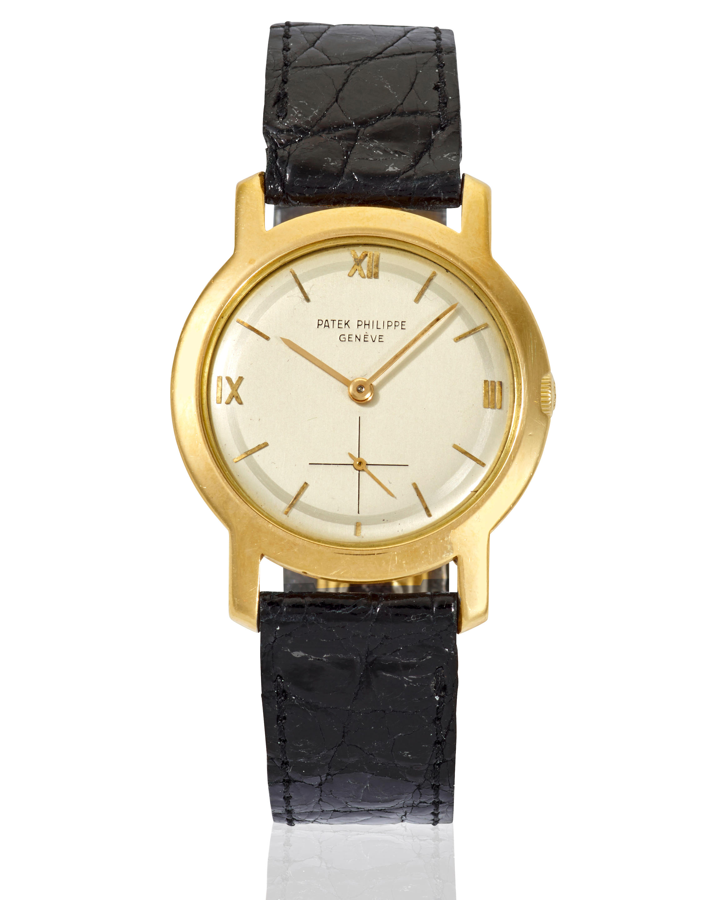 PATEK PHILIPPE. AN 18K GOLD MANUAL WIND WRISTWATCH