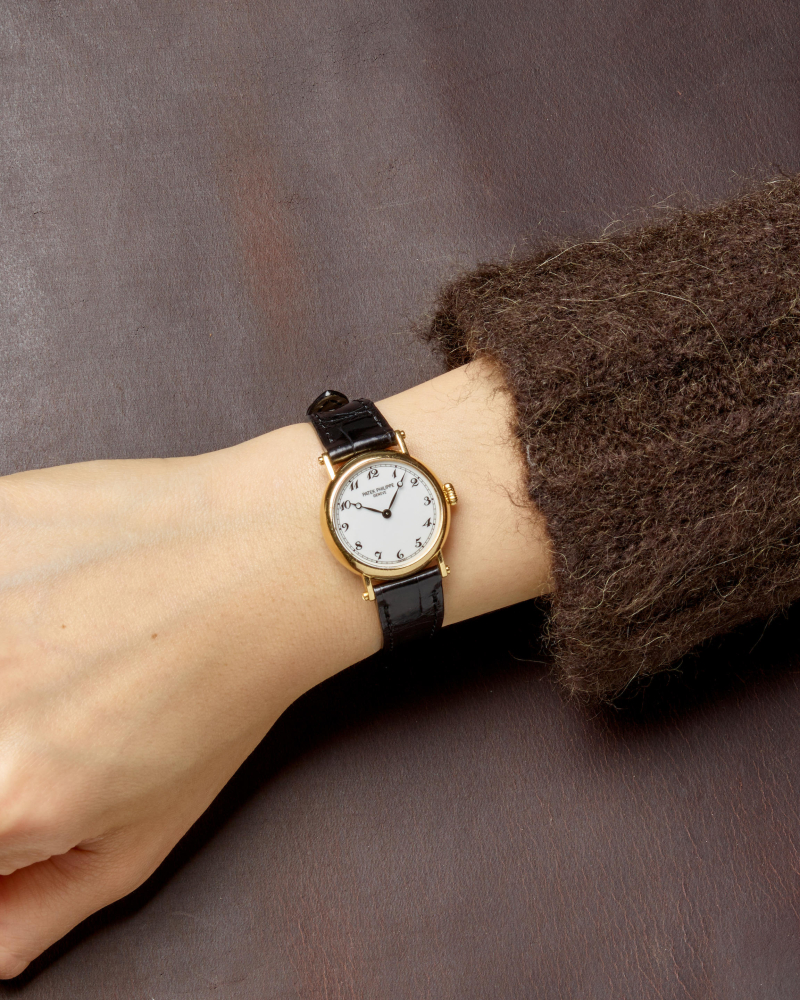 PATEK PHILIPPE. A LADY'S 18K GOLD MANUAL WIND WRISTWATCH