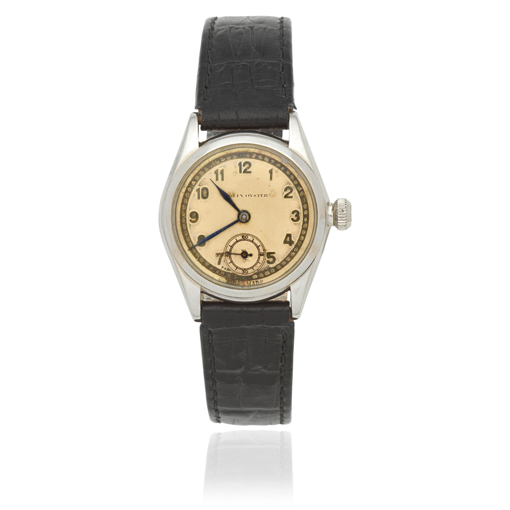 Rolex. A stainless steel manual wind wristwatch