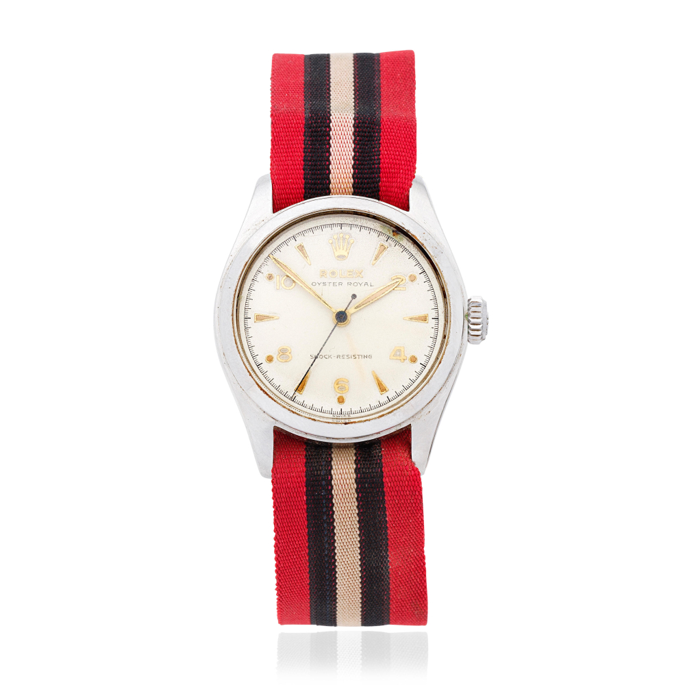 Rolex. A stainless steel manual wind wristwatch