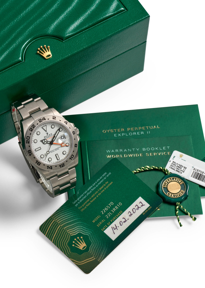 ROLEX. A STAINLESS STEEL AUTOMATIC CALENDAR BRACELET WATCH WITH DUAL TIME ZONE