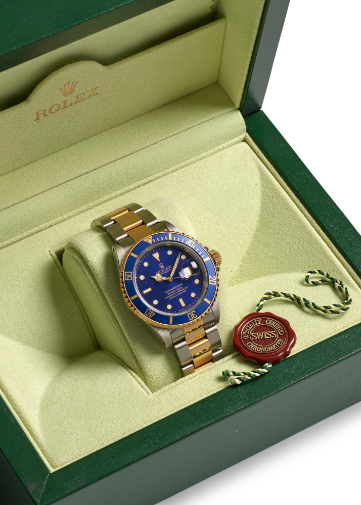 ROLEX. A STAINLESS STEEL AND GOLD AUTOMATIC CALENDAR BRACELET WATCH