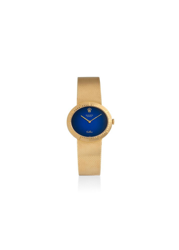 ROLEX. AN 18K GOLD MANUAL WIND BRACELET WATCH