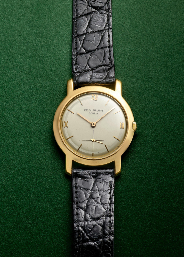 PATEK PHILIPPE. AN 18K GOLD MANUAL WIND WRISTWATCH