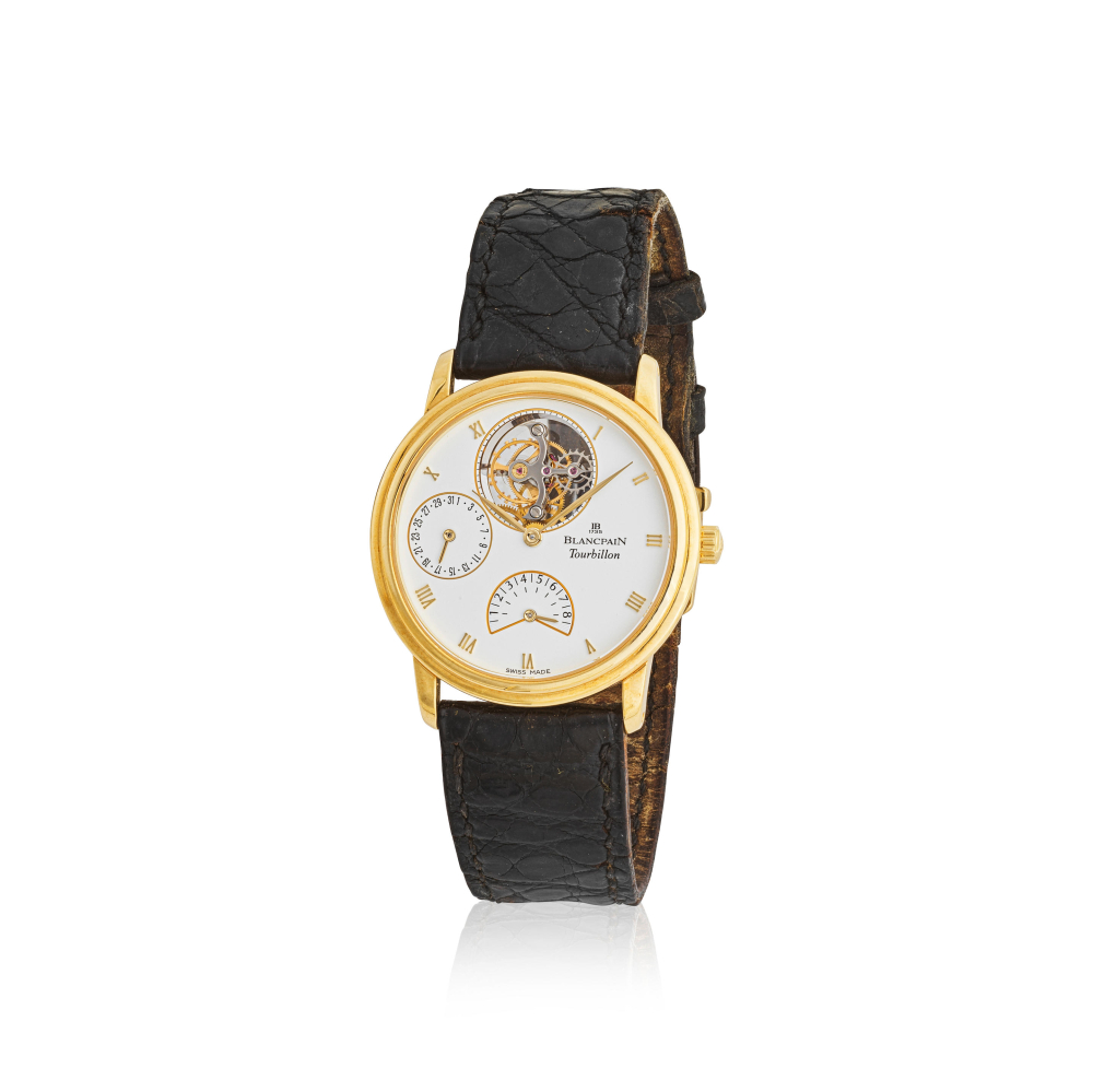Blancpain. A fine and rare 18K gold manual wind tourbillon calendar wristwatch with 8 days power reserve